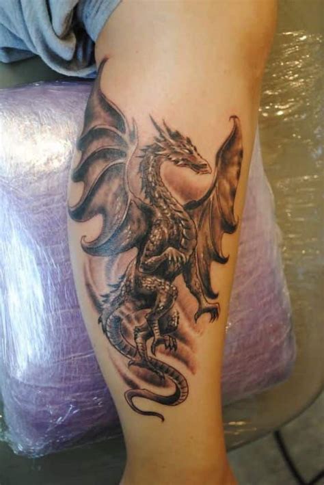 tatuaje dragon pierna|76 Ideas de Tatuajes de DRAGONES y sus Significados